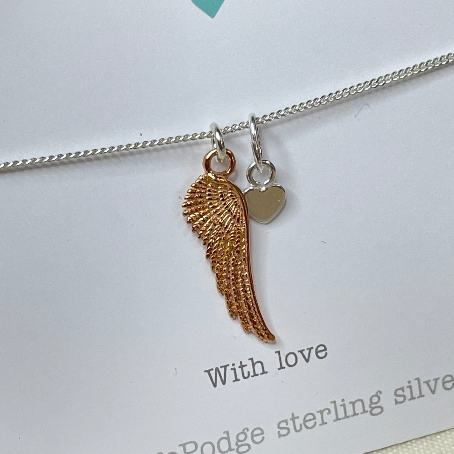 Angel wing and heart sterling silver necklace