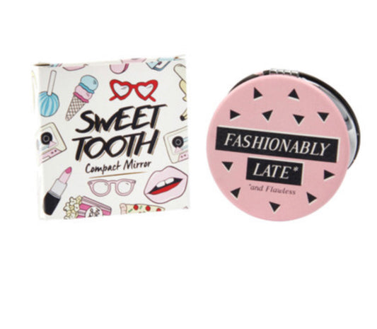 Fashionably late and flawless compact mirror. Sweet tooth