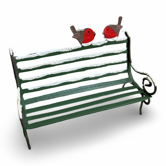 Snow covered park bench with robin pair ornament/cake topper