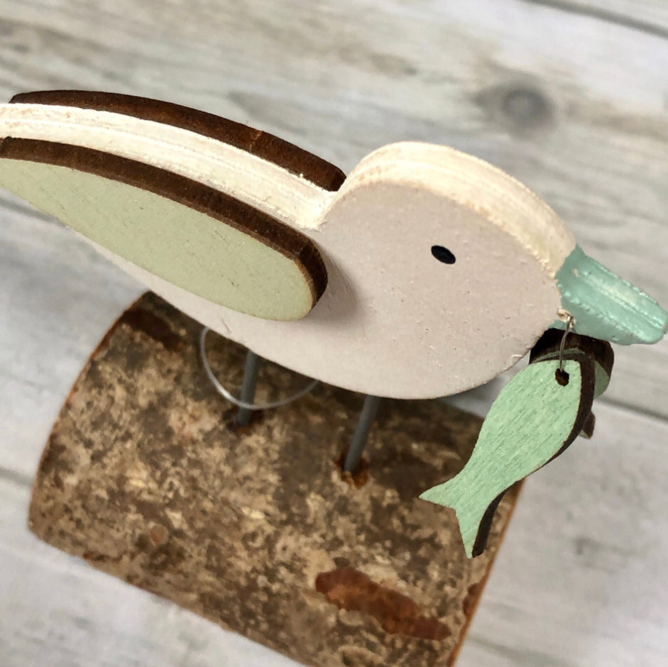 Seagull with his catch wooden ornament by shoeless Joe