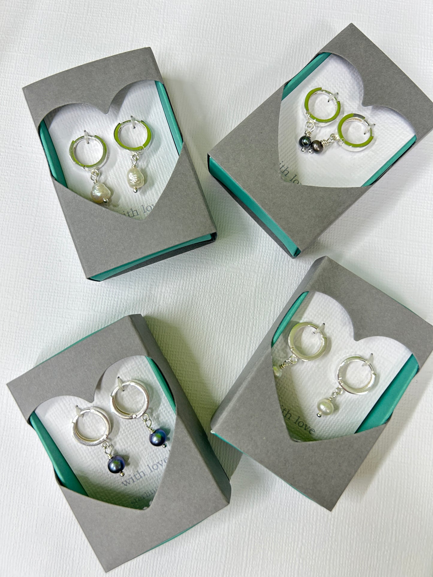 Huggie Hoop earrings with pearl drop