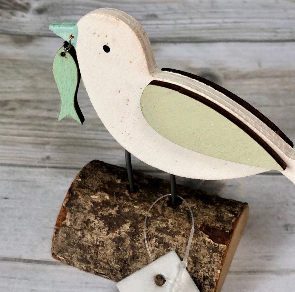 Seagull with his catch wooden ornament by shoeless Joe