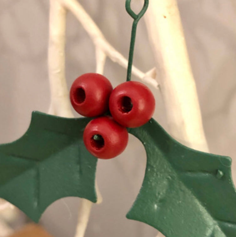Hanging holly Christmas decorations by Shoeless Joe