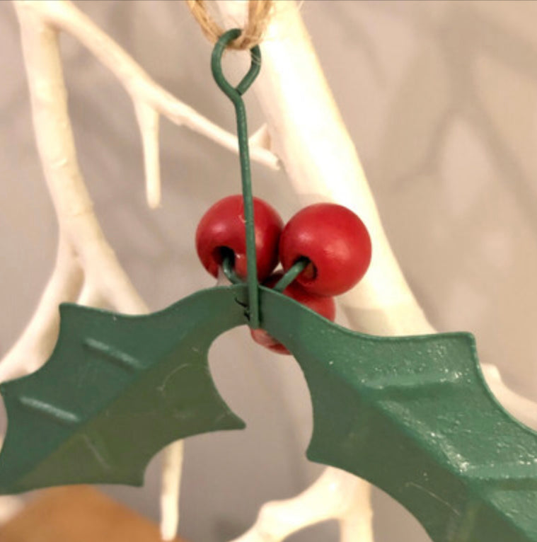 Hanging holly Christmas decorations by Shoeless Joe