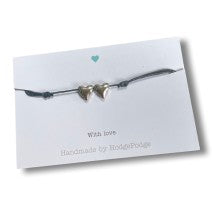 Adjustable cord bracelet heart beads