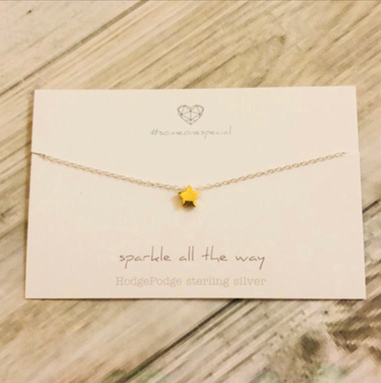 Gold star necklace- sparkle all the way. Sterling silver necklace