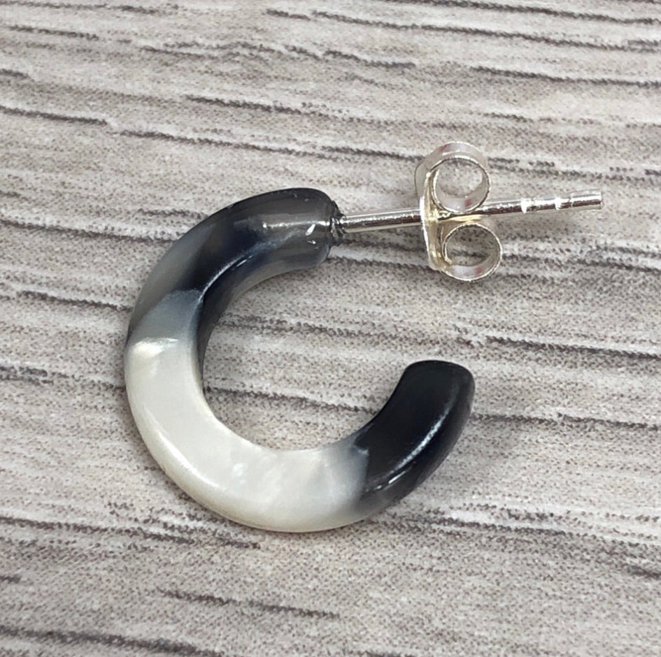 Black and white resin half hoop Sterling Silver earrings.