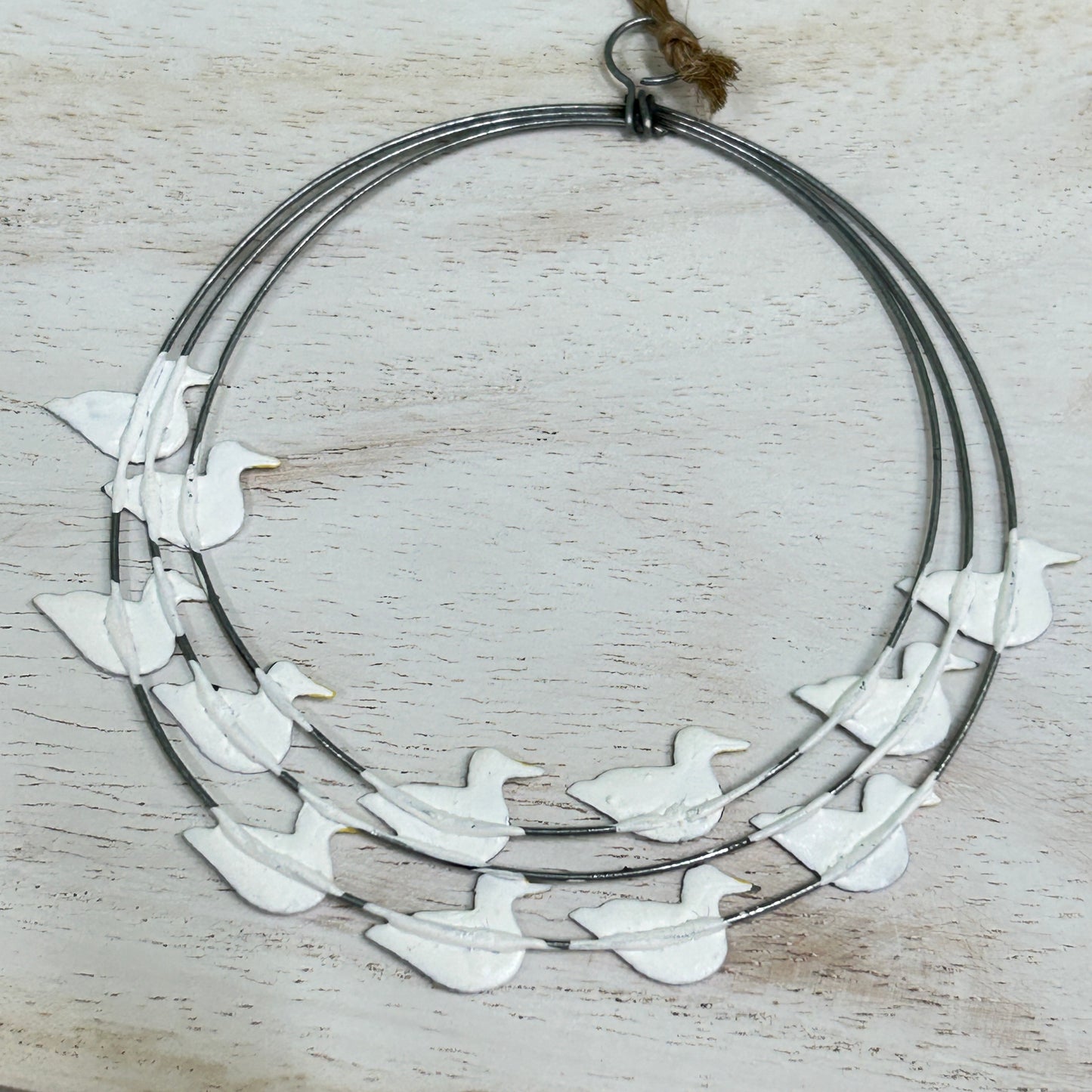 Seagull ring hanging decoration.