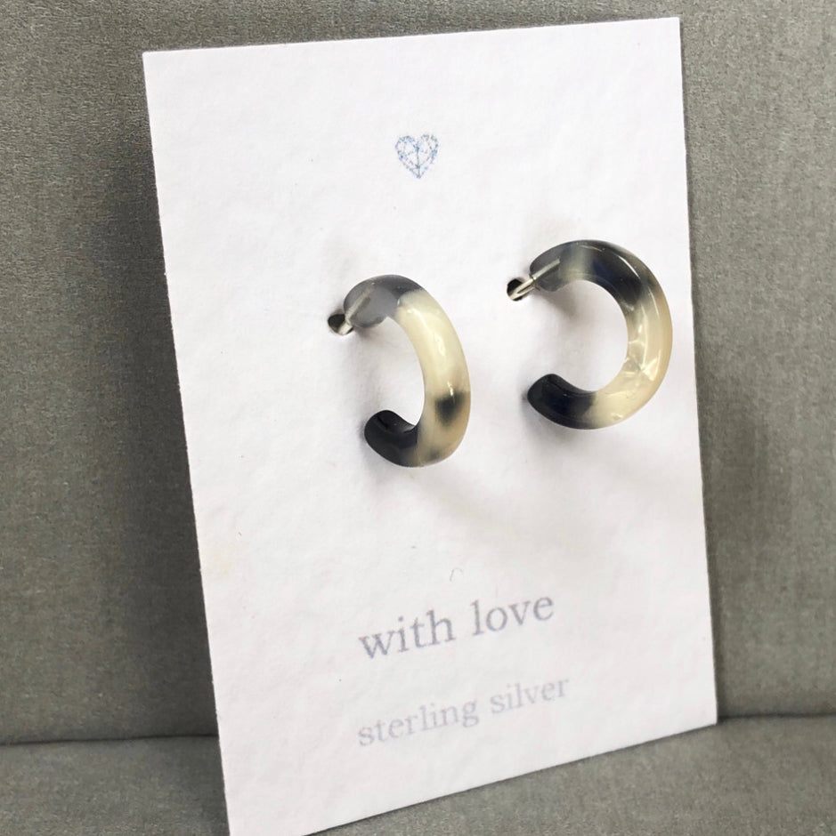 Black and white resin half hoop Sterling Silver earrings.