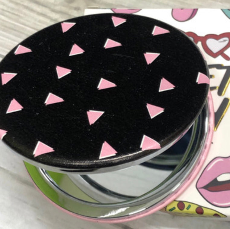 Fashionably late and flawless compact mirror. Sweet tooth