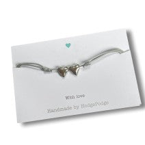 Adjustable cord bracelet heart beads