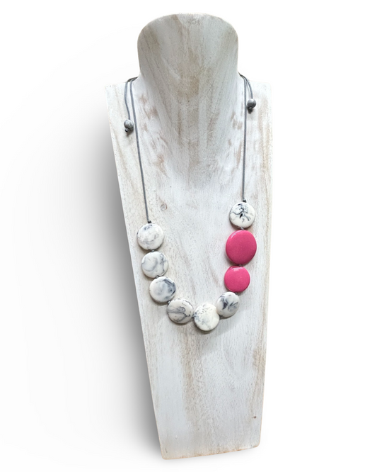 Adjustable cord Smoked resin disc necklace with a pink accent colour