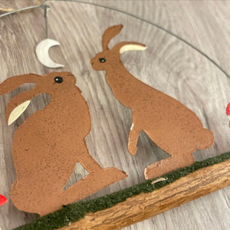 Hares on twig hanging decoration by Shoeless Joe