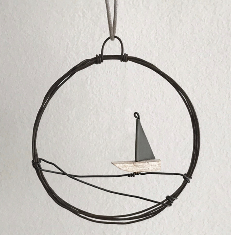 Small metal wreath, sail boat by East of India