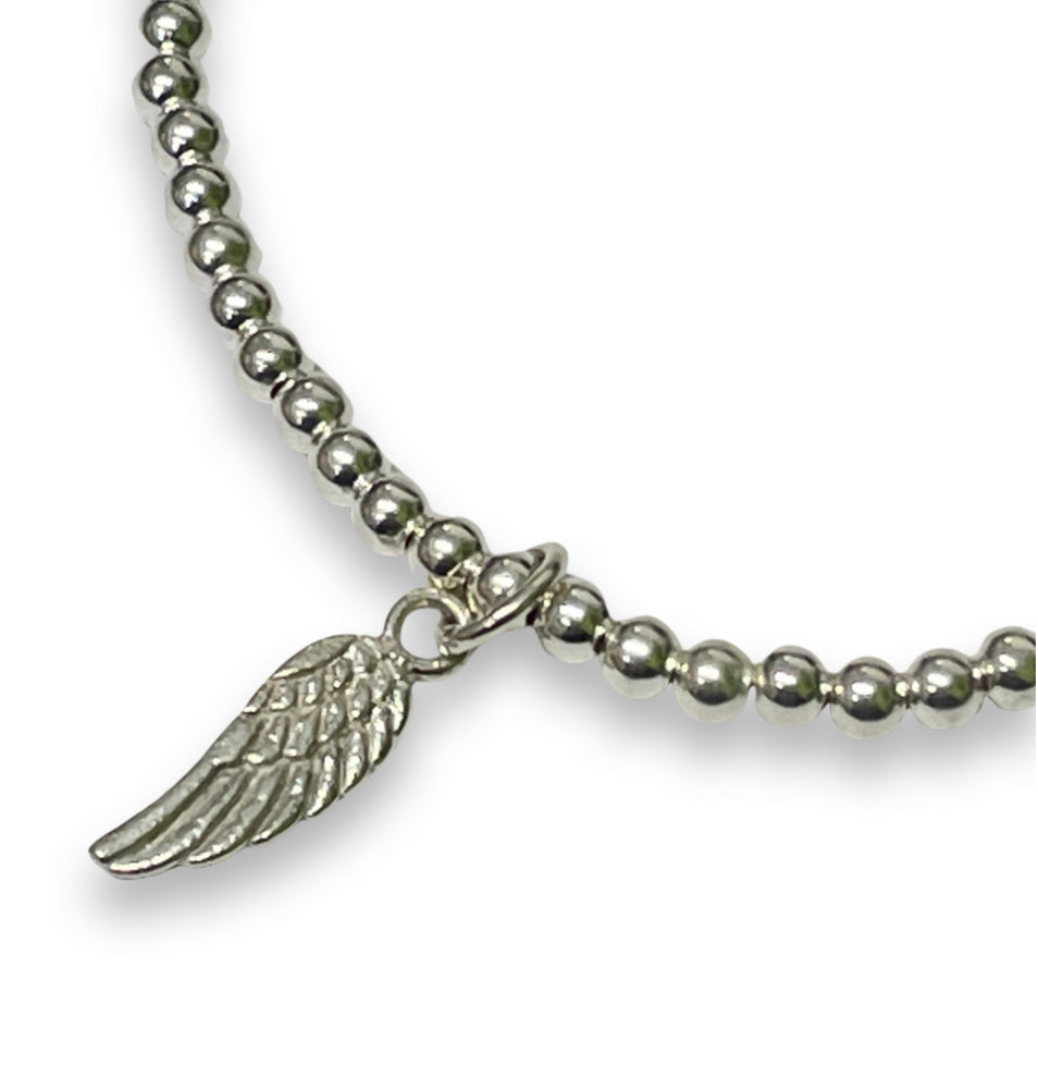 Sterling silver beaded bracelet with angel wing charm