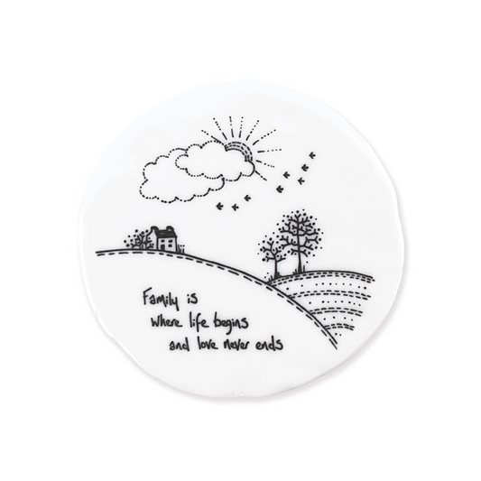 Family is where life begins and love never ends. Round ceramic coaster