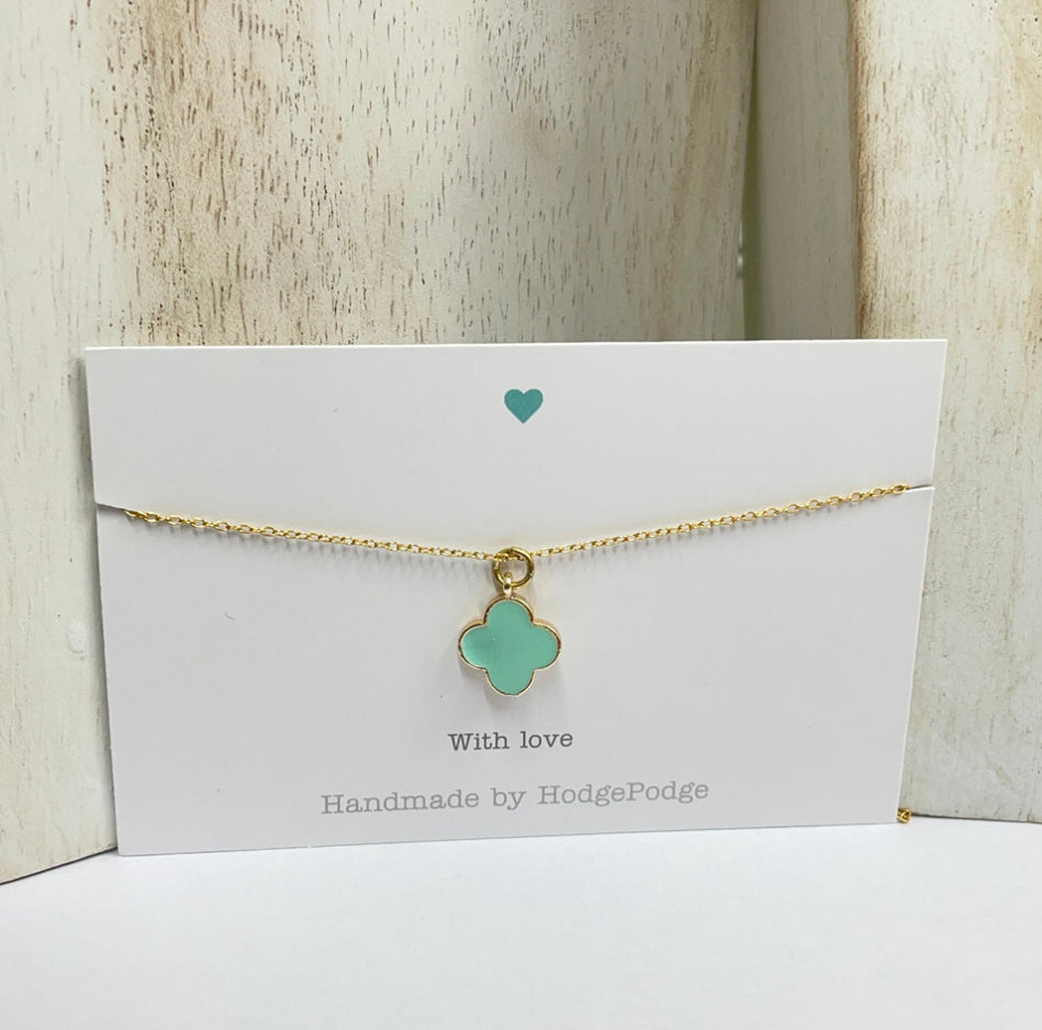 Enamel & gold clover necklace. Fine cable chain