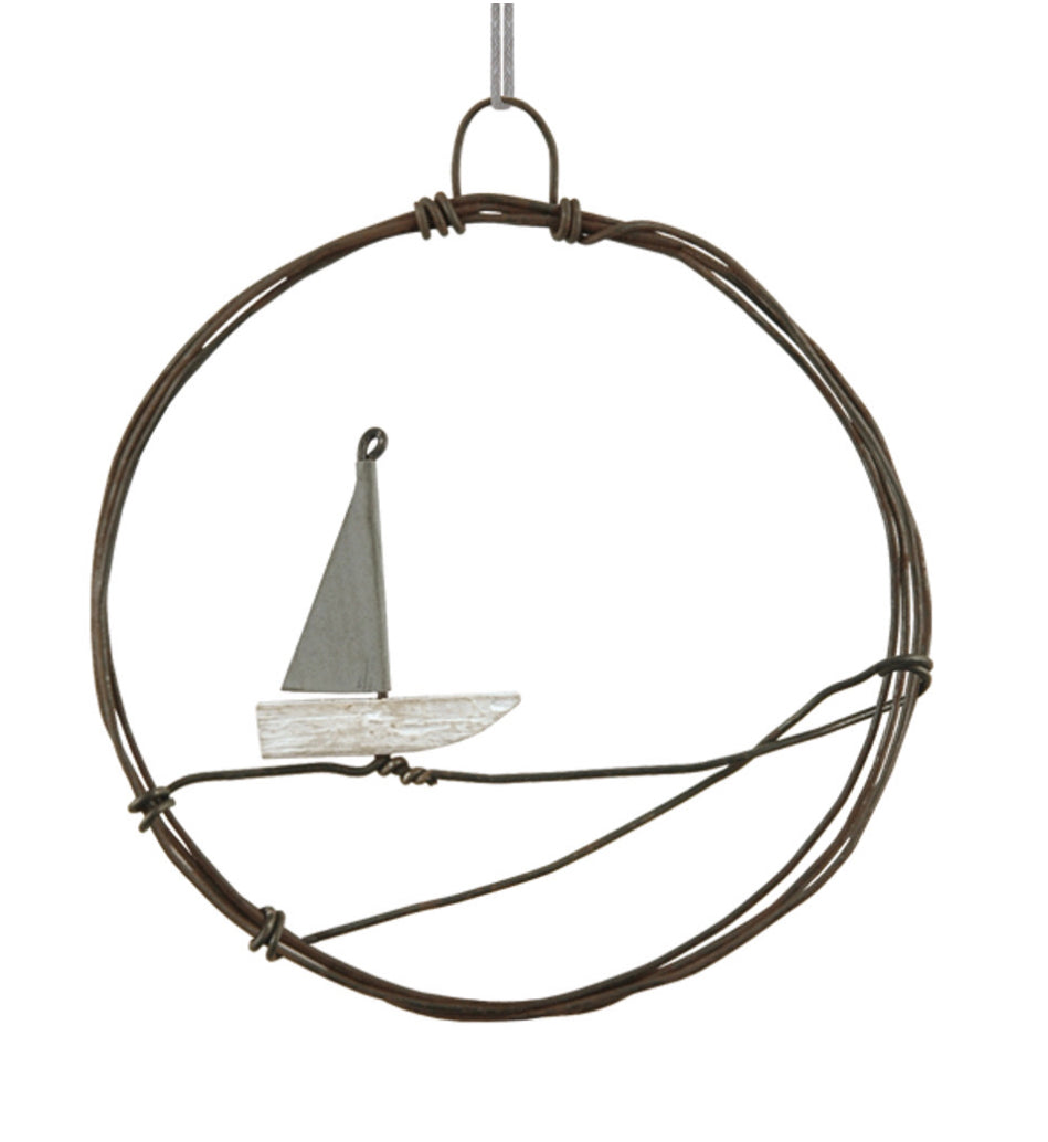 Small metal wreath, sail boat by East of India