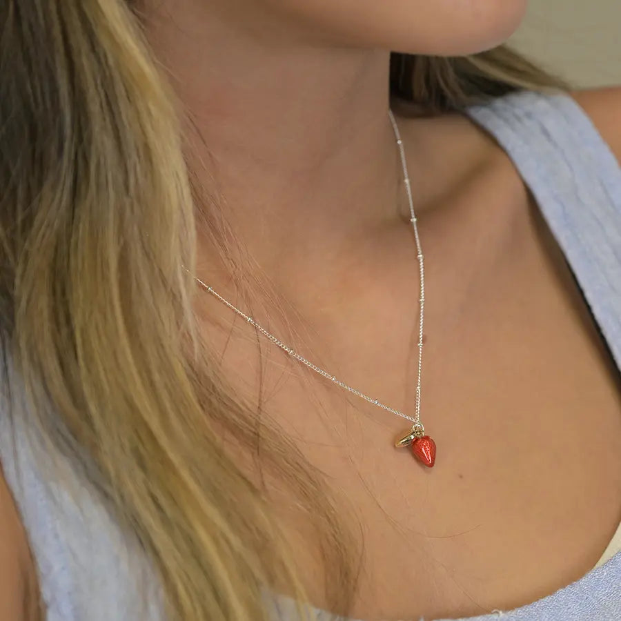 Silver plated necklace with enamel strawberry and golden heart