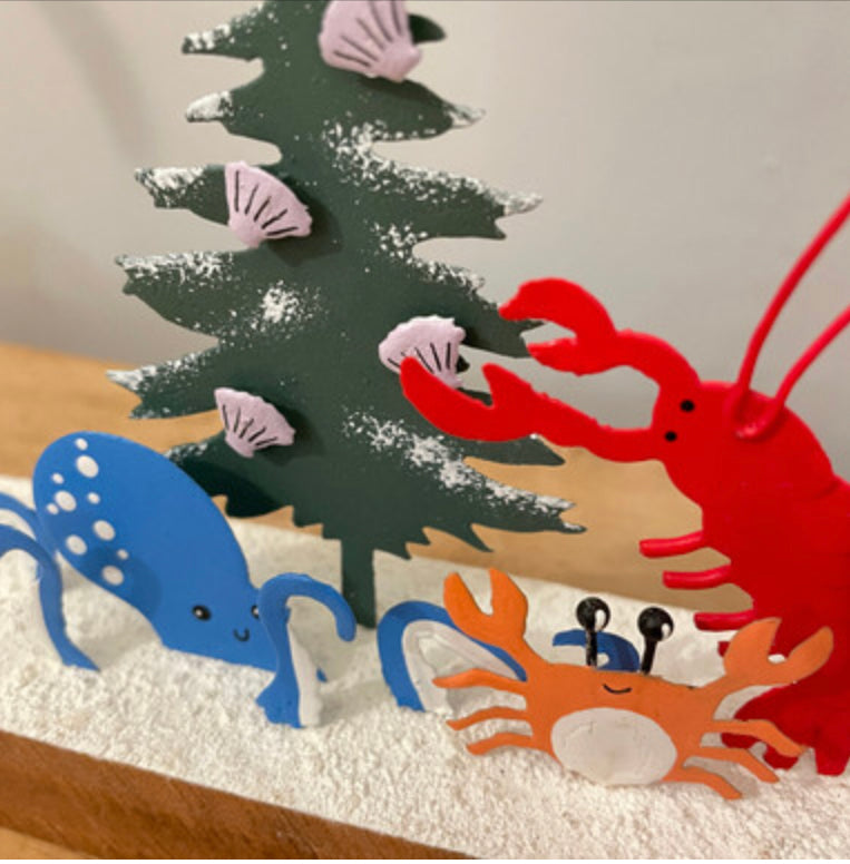 Lobster, octopus & crab decorating the Christmas tree. Standing ornament by Shoeless Joe