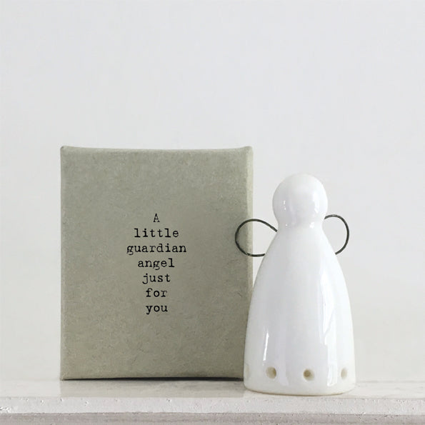 A little guardian Angel just for you . Tiny ceramic Angel