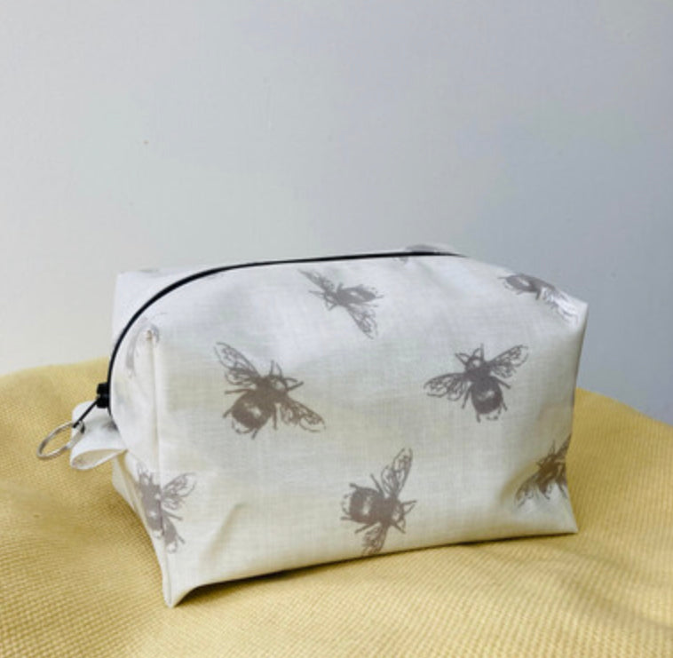 Grey bee vinyl fabric pouches / washbags by Stella's Stitchcraft