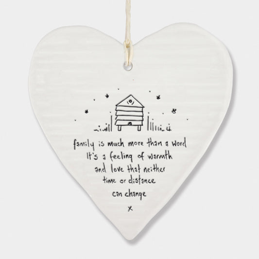 Family is much more than a word .... ceramic hanging heart by east of India