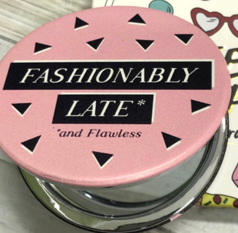 Fashionably late and flawless compact mirror. Sweet tooth