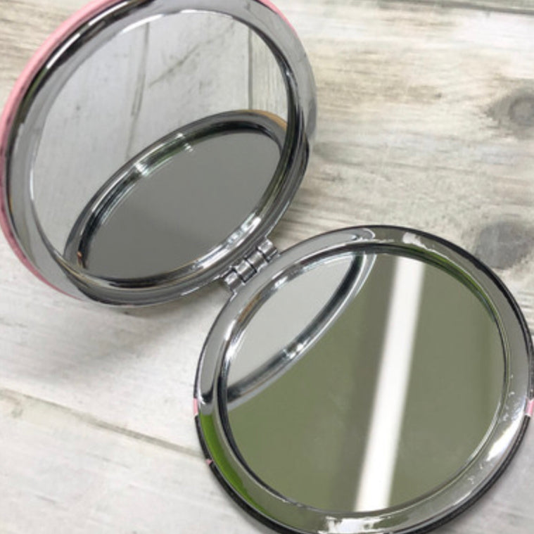 Fashionably late and flawless compact mirror. Sweet tooth