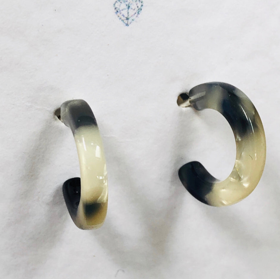 Black and white resin half hoop Sterling Silver earrings.