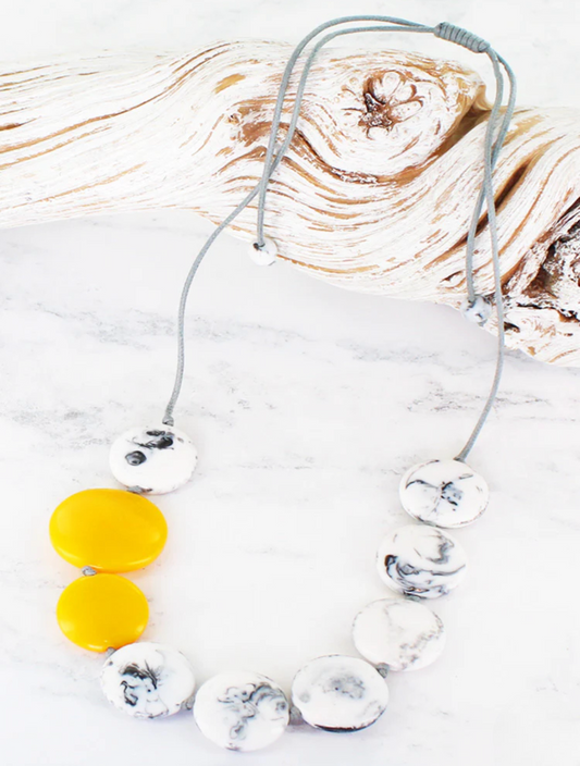 Adjustable cord Smoked resin disc necklace with a yellow accent colour