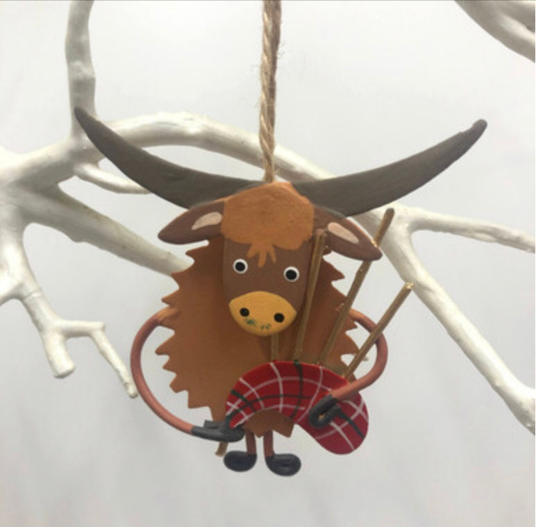 Bagpiping highland cow hanging decoration by Shoeless Joe