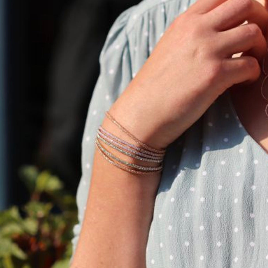 Multi strand gold plated & blush crystal bracelets by Pom