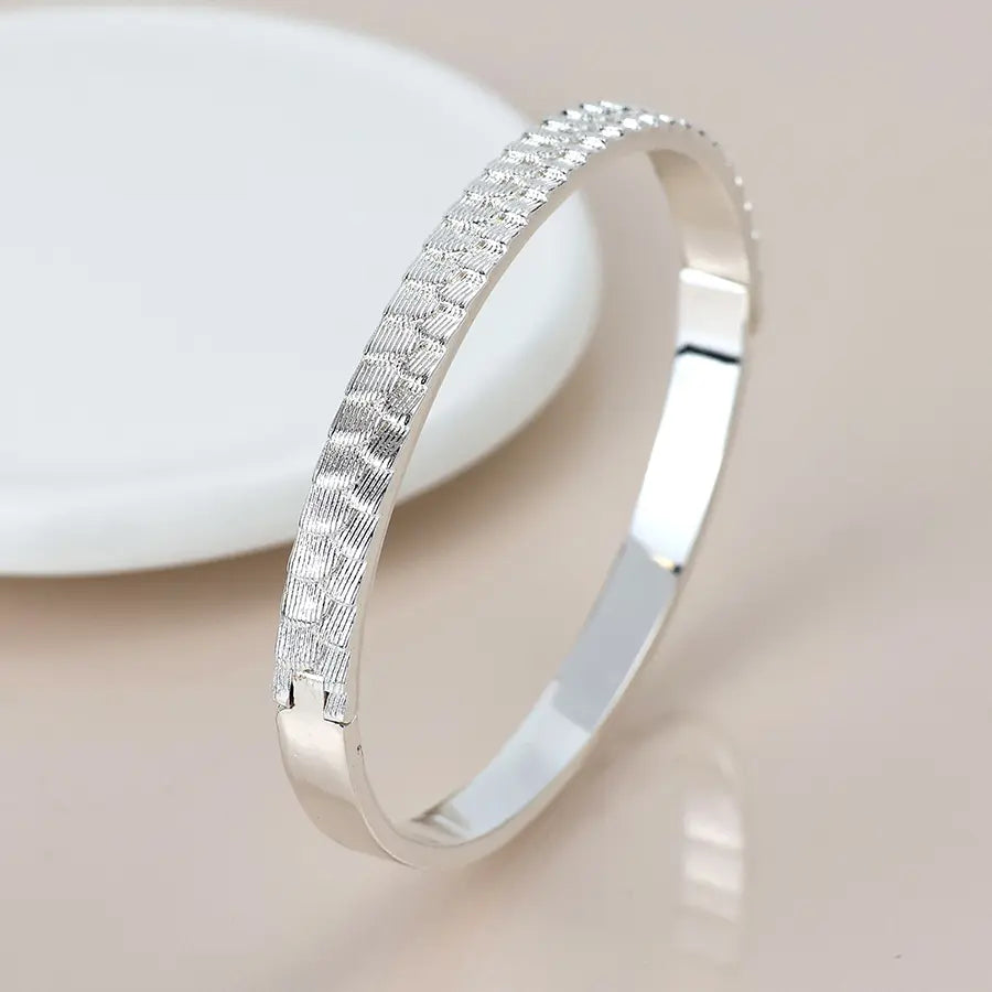 Silver plated scallop embossed bangle