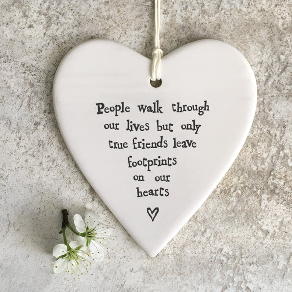 East of India porcelain heart shaped hanger. People walk through our lives but only true friends leave  footprints on our hearts