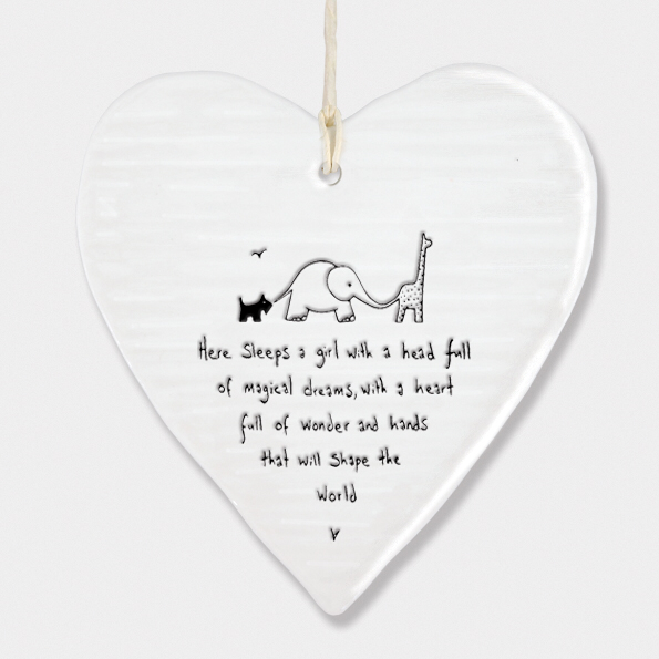 Here sleeps  a girl with a head full of magical dreams , with a heart full of wonderland hands that will shape the world. Hanging porcelain heart by East of India
