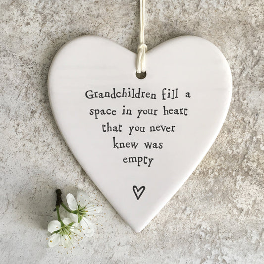 East of India hanging heart. Grandchildren fill a space in your heart that you never knew was empty.