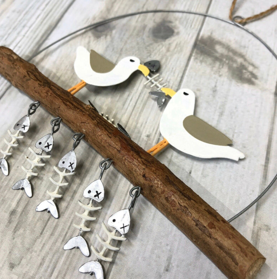 Seagulls sharing platter hanging decoration by Shoeless Joe