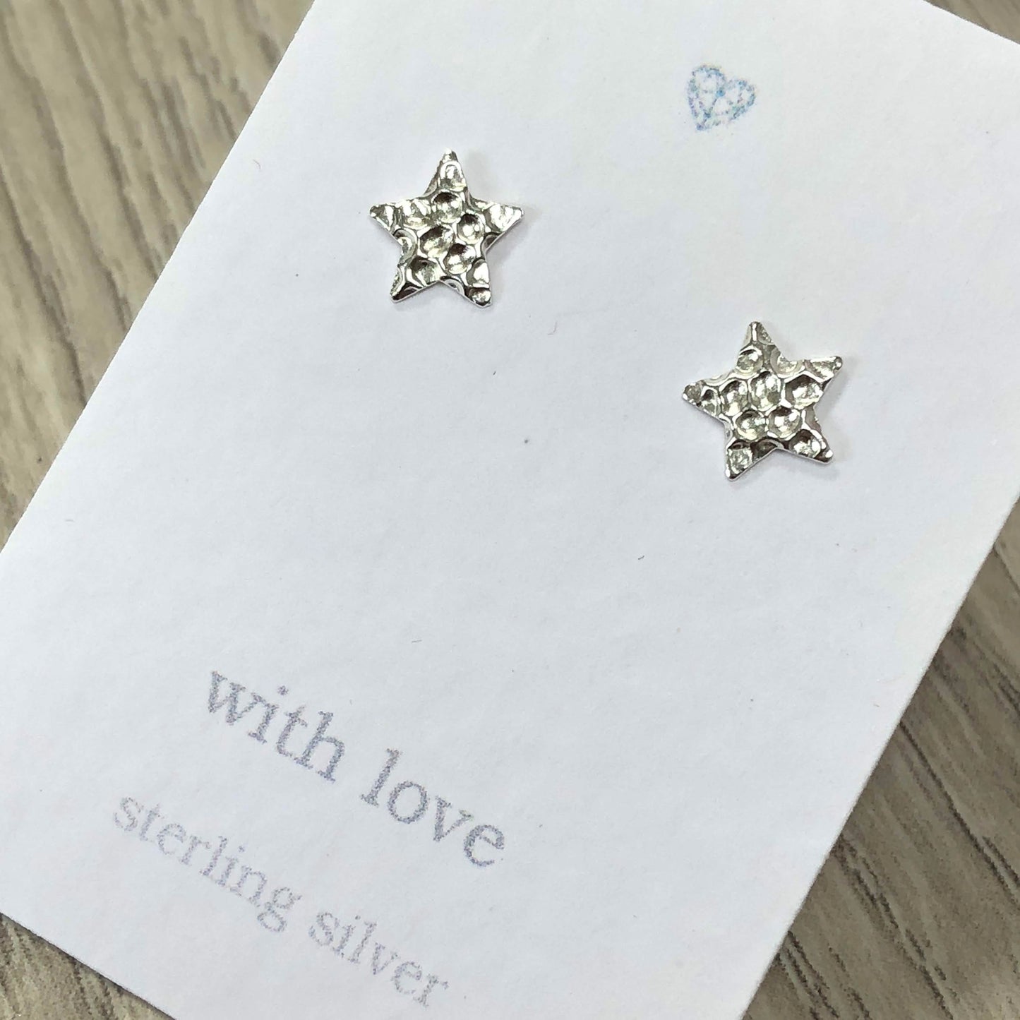 Dimpled textured star stud earrings sterling silver