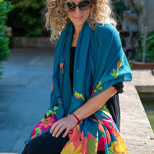 Teal blue recycled scarf with tropical print edge