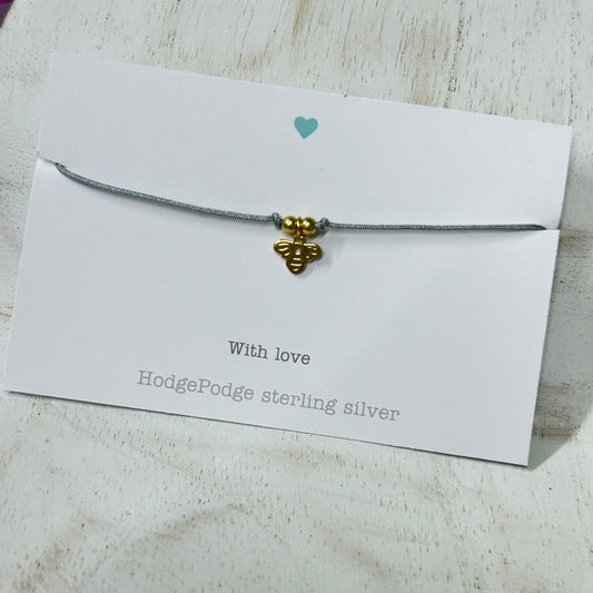 Gold bee charm adjustable cord bracelet