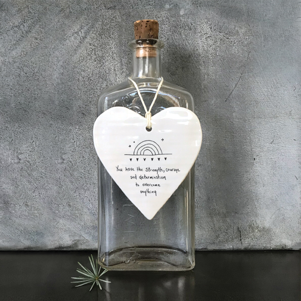 You have the strength, courage and determination to overcome anything. Ceramic heart by East of India