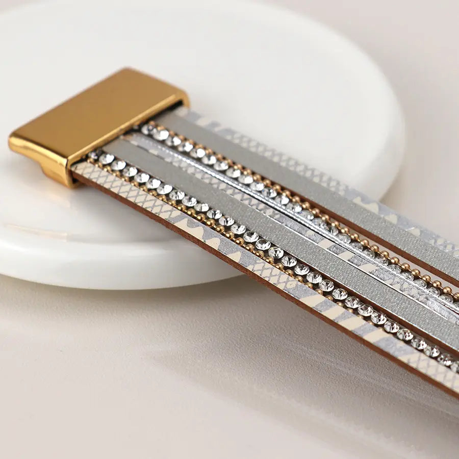 Grey leather, gold and crystal multistrand bracelet
