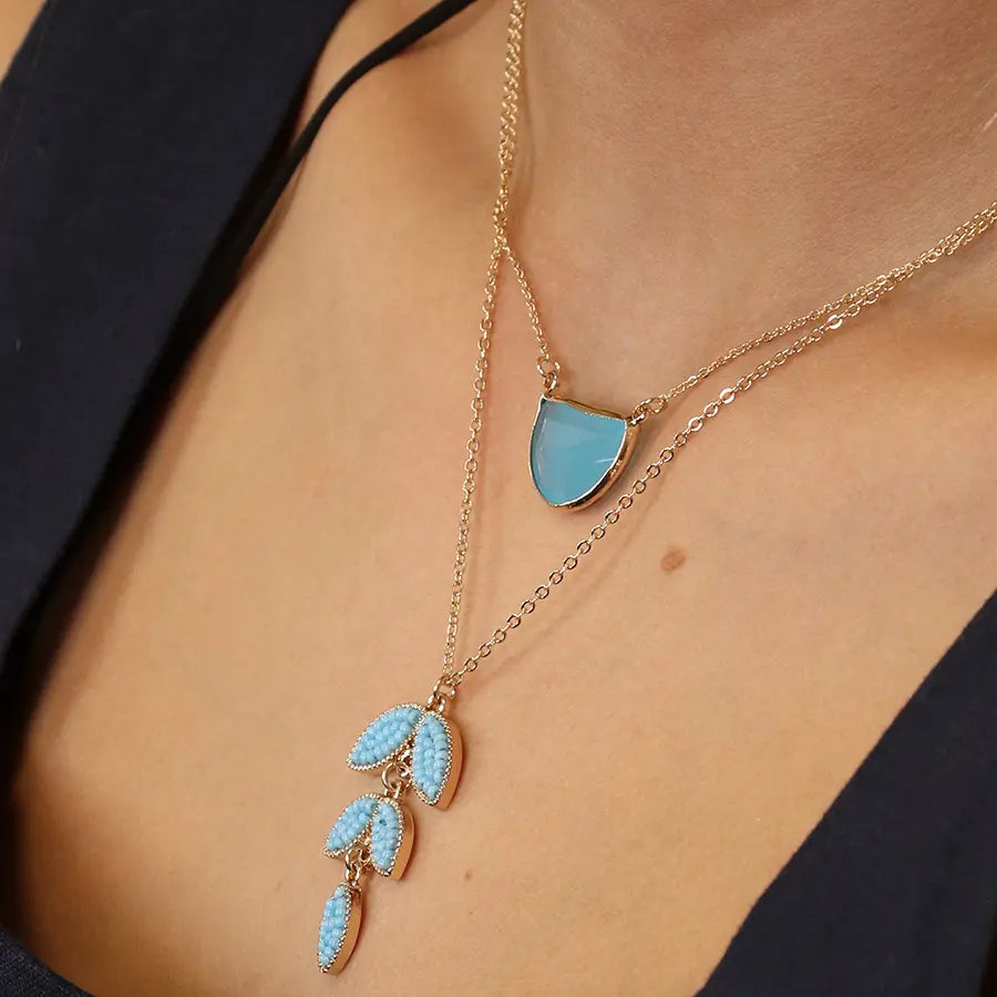 Golden and blue crystal half moon necklace