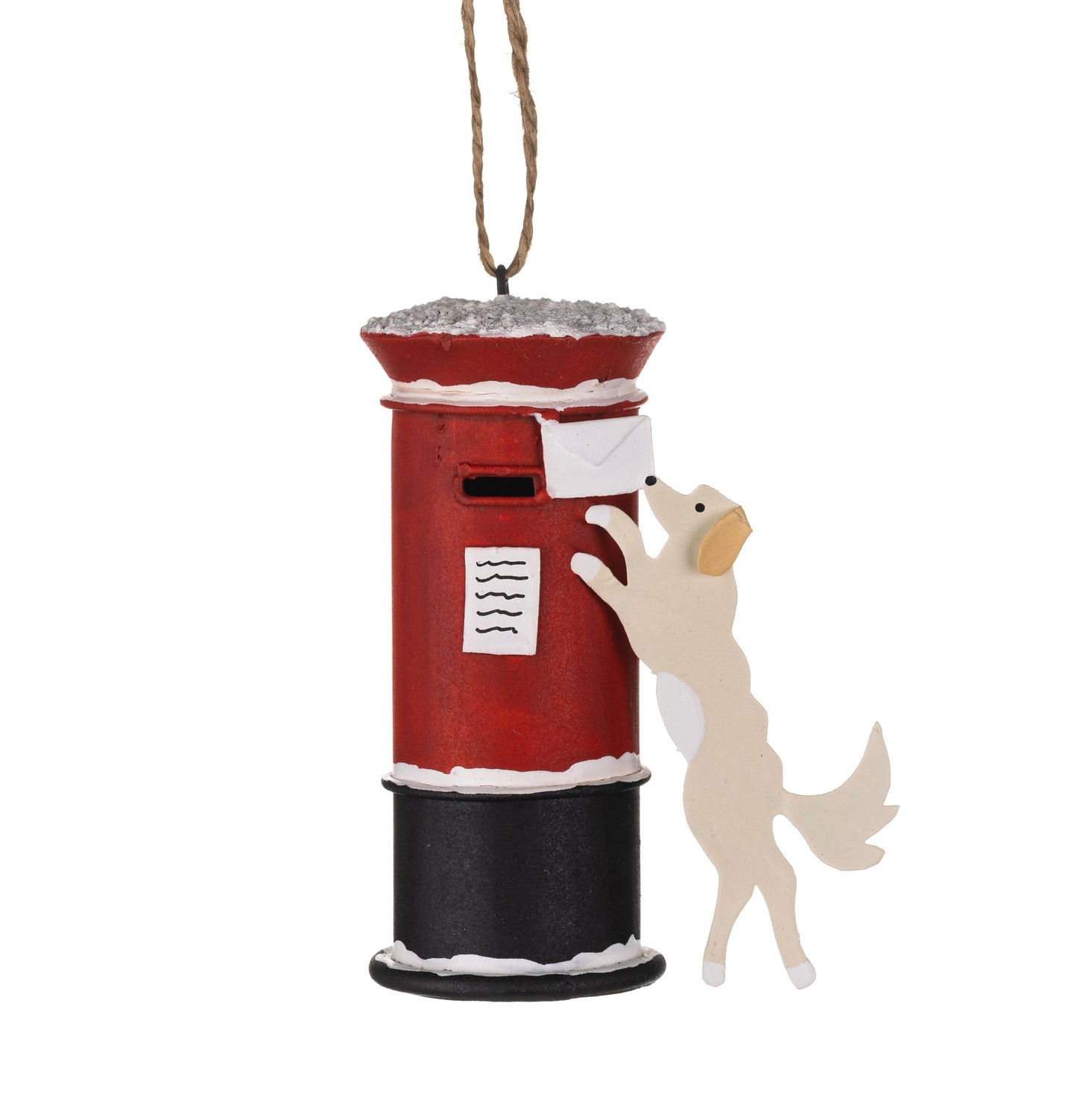 Dog posting a Christmas card hanging ornament