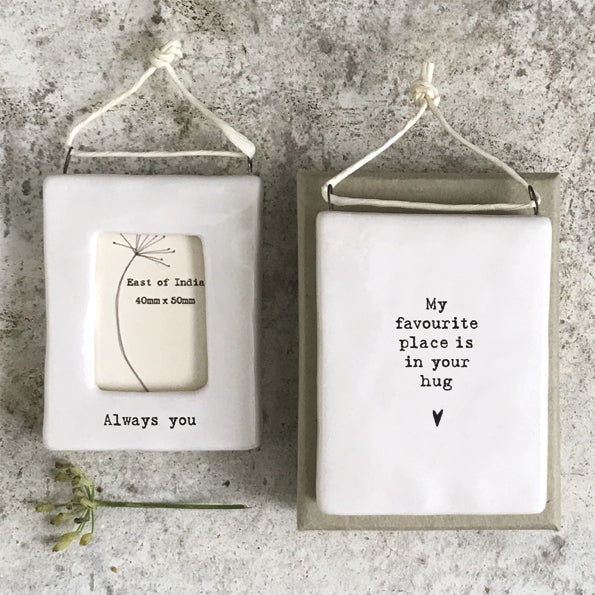 My favorite Place is your Hug.  Small ceramic photo frame