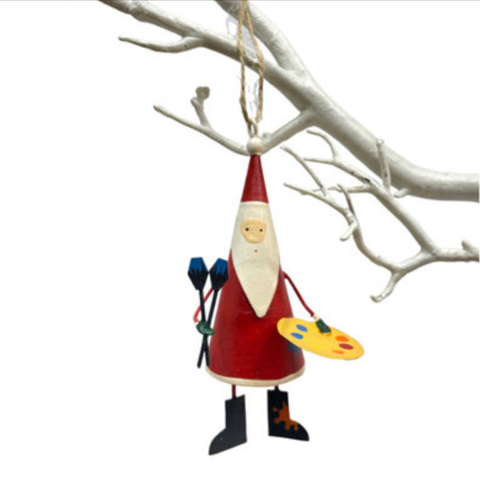 Artist Santa hanging Christmas decoration by Shoeless Joe