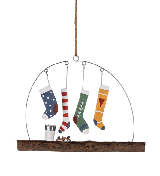 Four jolly Christmas stockings hanging decoration