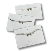 Adjustable cord bracelet heart beads