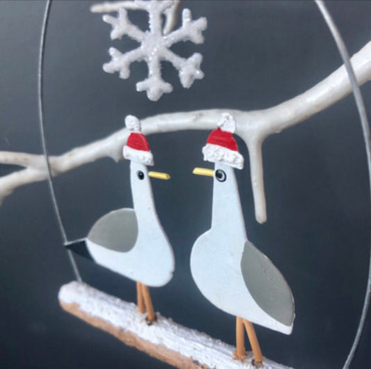 Two seagulls in Christmas hats , hanging decoration by Shoeless Joe